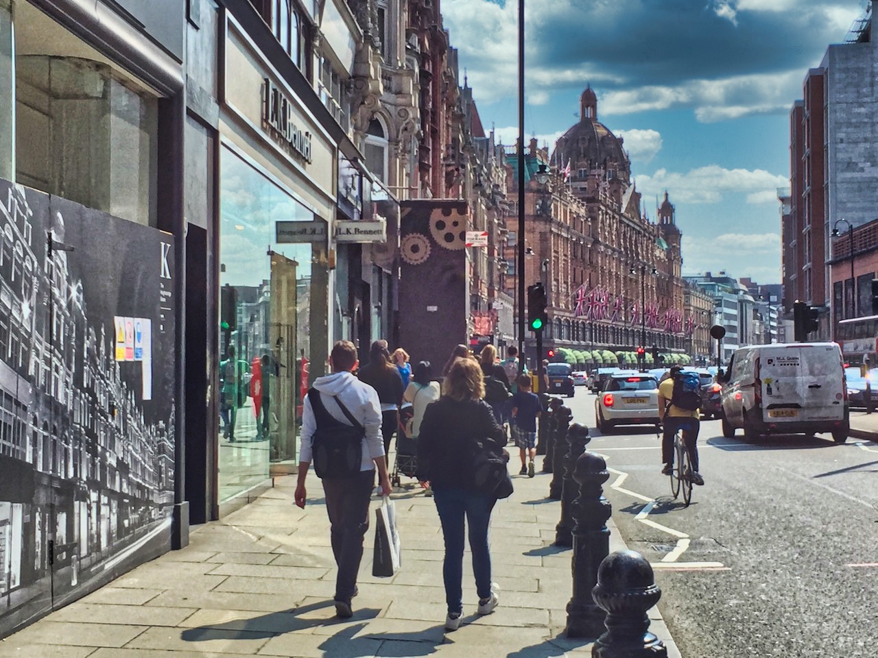 Brompton Road with Harrods Ahead (green awnings and flags)
